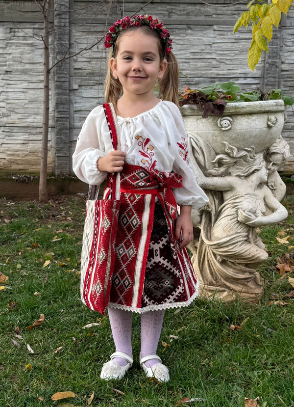 Trăistuță de colind țesută cu simboluri tradiționale